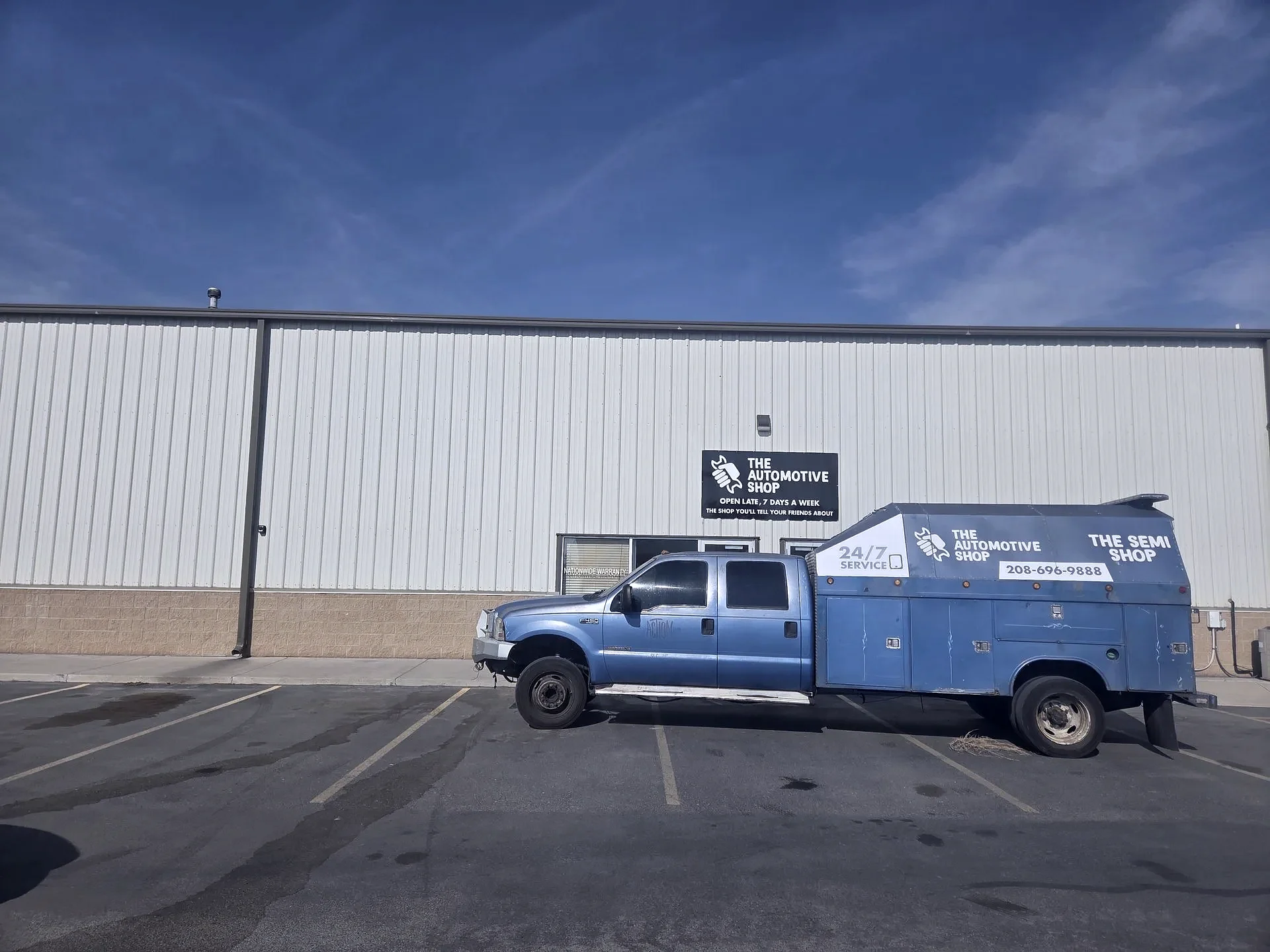 The Automotive Shop building in Jerome, Idaho, with a branded service truck out front
