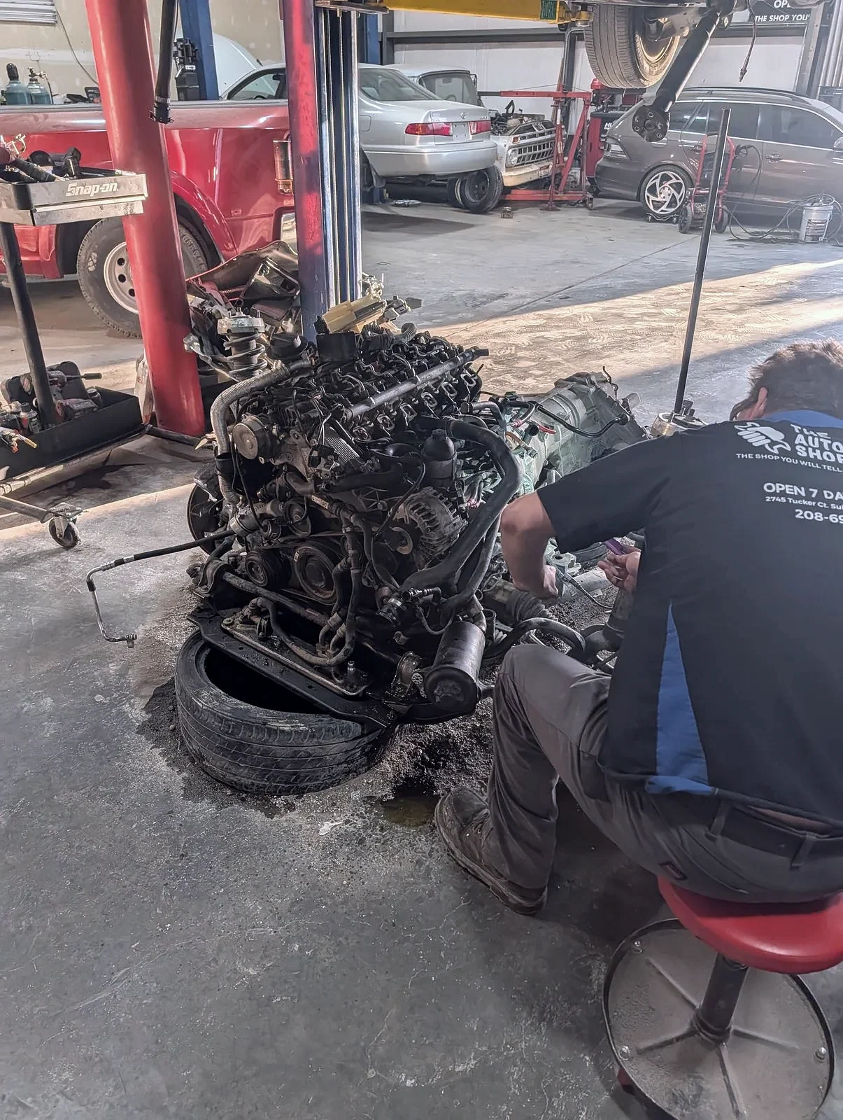 A technician performing engine repair in Jerome, Idaho